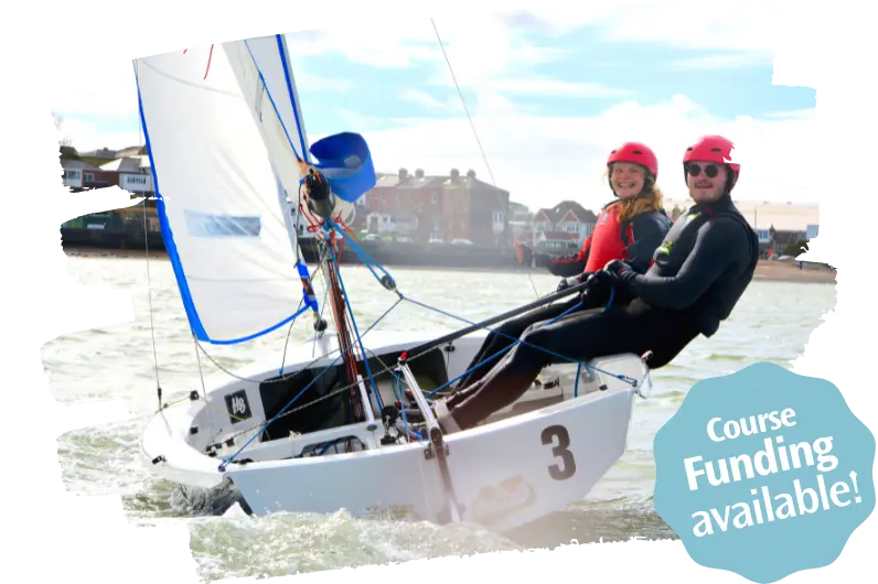 two students sailing - Course funding available