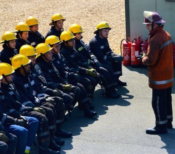 Fire Fighting students with an instructor