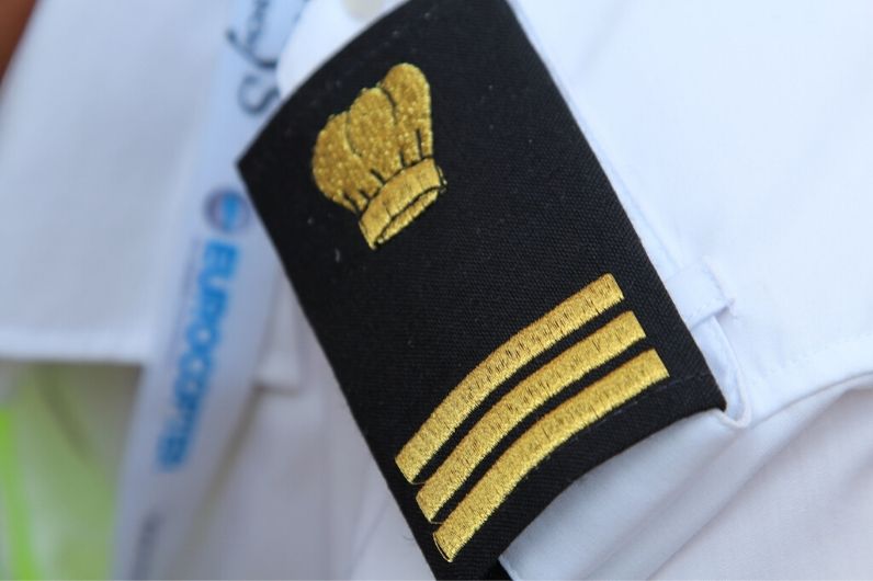 A close up of a naval officers epaulette