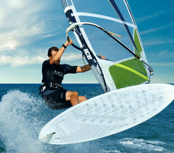 A student learning to windsurf
