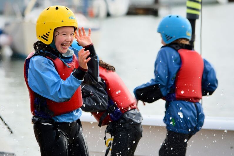 Children being splashed with water